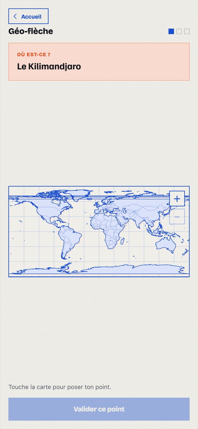 La Géo-flèche : une carte du monde imprimée, sur laquelle on pose un point.
